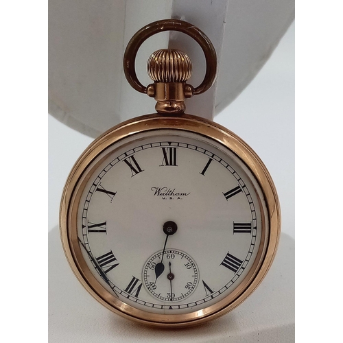 409 - An Antique Waltham Gold Plated Pocket Watch. Top winder. Dennison case. 5cm diameter. In working ord... 