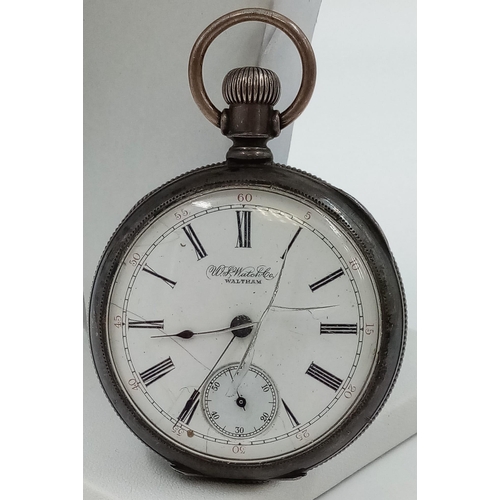 438 - An Antique Waltham Silver-Cased Pocket Watch. Deuber silver case. Inscription from 1897. 5.5cm diame... 