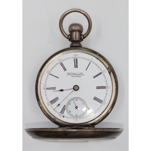 438 - An Antique Waltham Silver-Cased Pocket Watch. Deuber silver case. Inscription from 1897. 5.5cm diame... 