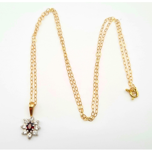 472 - A 9K Yellow Gold Disappearing Necklace with a White and Red Stone 9K Gold Pendant. 40cm and 12mm. .8... 