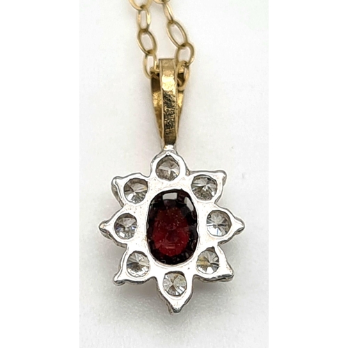 472 - A 9K Yellow Gold Disappearing Necklace with a White and Red Stone 9K Gold Pendant. 40cm and 12mm. .8... 