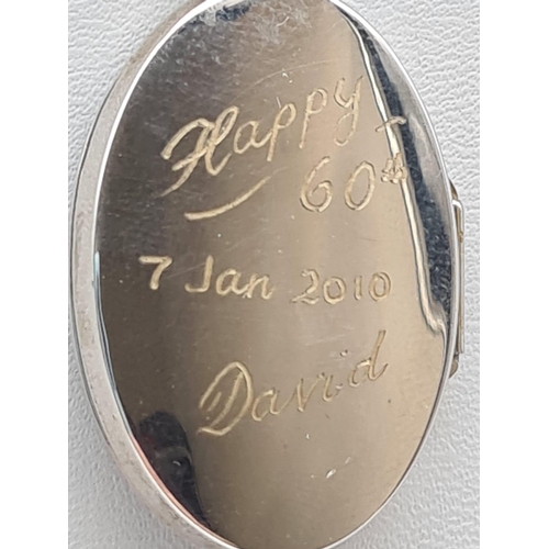 480 - Two Silver Oval Lockets on Silver Necklaces. Note: If you have a friend named David and he is about ... 