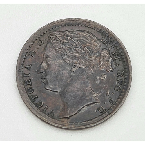 302 - An 1866 Bronze Third Farthing Coin. Near Extremely Fine. Obverse - Features the laureate bun head of... 