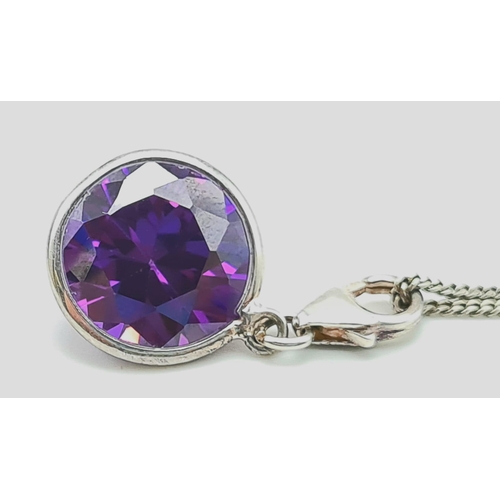 956 - Ladies Italian Sterling Silver and Diamond Cut Purple Stone Pendant Necklace 46cm length, 13mm diame... 