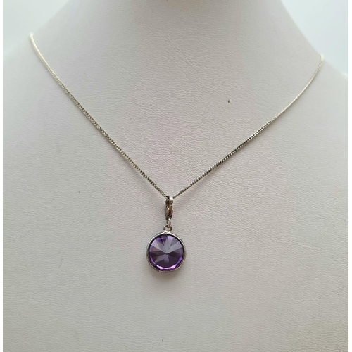 956 - Ladies Italian Sterling Silver and Diamond Cut Purple Stone Pendant Necklace 46cm length, 13mm diame... 