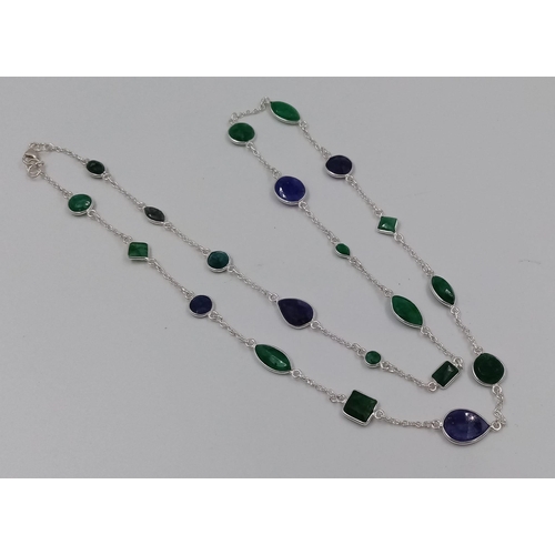 732 - A 17g Emerald and Blue Sapphire Gemstone long chain necklace set in 925 silver. 68cm.