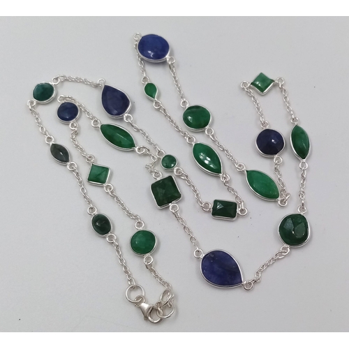 732 - A 17g Emerald and Blue Sapphire Gemstone long chain necklace set in 925 silver. 68cm.