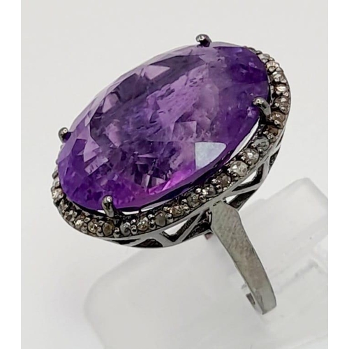 723 - A 19ct Amethyst Gemstone ring with .45ct diamonds in pave setting, 925 silver black antique finish. ... 