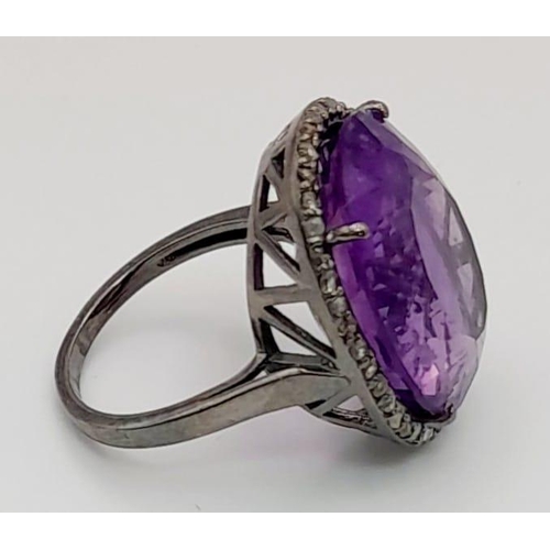 723 - A 19ct Amethyst Gemstone ring with .45ct diamonds in pave setting, 925 silver black antique finish. ... 