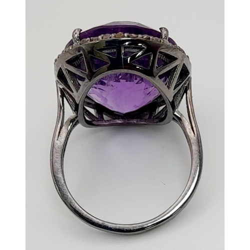 723 - A 19ct Amethyst Gemstone ring with .45ct diamonds in pave setting, 925 silver black antique finish. ... 