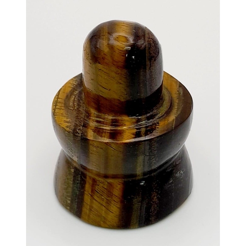 850 - A 71g Tigers Eye Carved Shivling Statue. 4.5cm