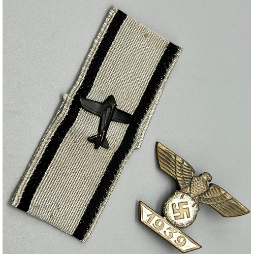 243 - A collection of replica Third Reich Ribbons and Badges