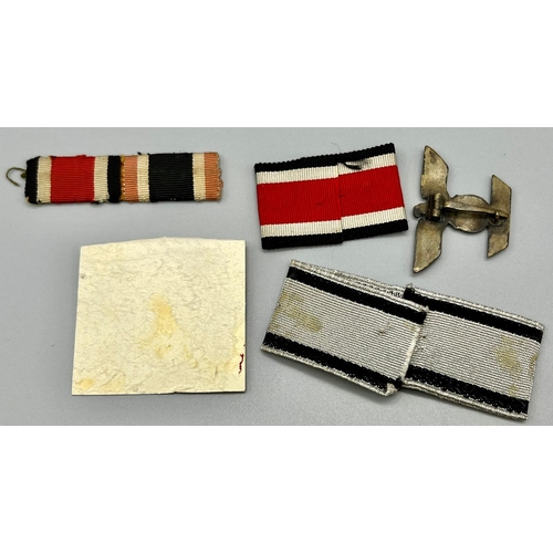 243 - A collection of replica Third Reich Ribbons and Badges