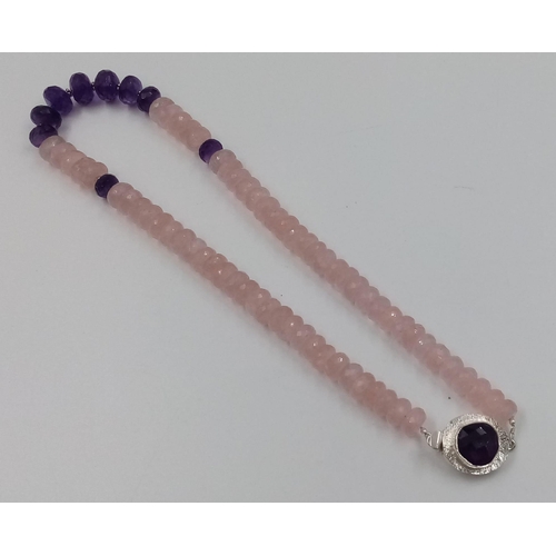 696 - A 400ct Rose Quartz Gemstone Necklace with Amethyst Beads and Amethyst Clasp in 925 silver. 44cm.