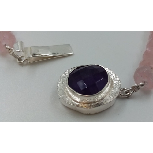 696 - A 400ct Rose Quartz Gemstone Necklace with Amethyst Beads and Amethyst Clasp in 925 silver. 44cm.