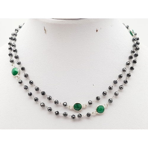 752 - A 35ct Very Delicate 2.5mm Black Moissanite Chain necklace in 925 Silver with Emeralds. 60cm.