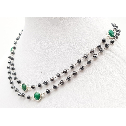 752 - A 35ct Very Delicate 2.5mm Black Moissanite Chain necklace in 925 Silver with Emeralds. 60cm.