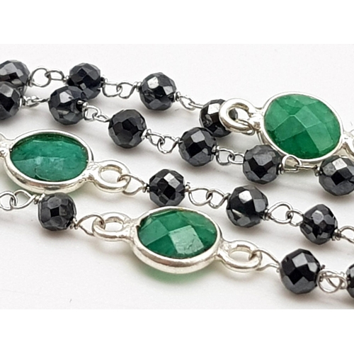 752 - A 35ct Very Delicate 2.5mm Black Moissanite Chain necklace in 925 Silver with Emeralds. 60cm.