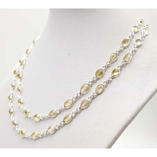 767 - A 20g Citrine Gemstone Long Chain Necklace set in 925 Silver. 78cm.