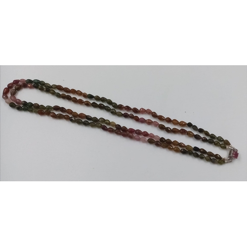 960 - A 168ct Fancy Tourmaline Drop shape beads necklace with Ruby Clasp in 925 Silver. 44cm.