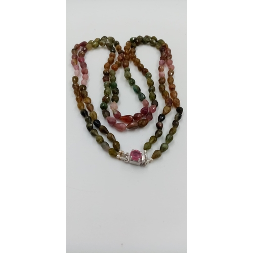 960 - A 168ct Fancy Tourmaline Drop shape beads necklace with Ruby Clasp in 925 Silver. 44cm.