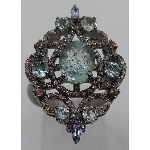 880 - A 3ct Aquamarine Gemstone Ring with 2ct Diamonds in a pave setting on 925 silver. Size N.