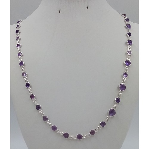 844 - A 21g Amethyst Gemstone Long Chain necklace set in 925 silver. 76cm