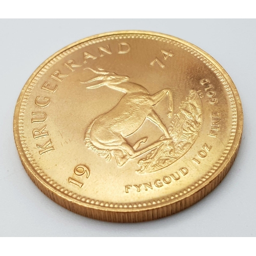 66 - A 22K Gold 1974 Krugerrand Coin. 1oz. 34g. 30mm diameter.