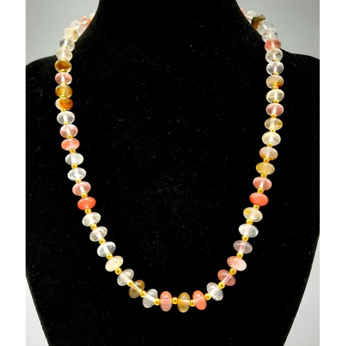 741 - A Pink-Orange Freshwater Pearl Necklace with 14K Yellow Gold Clasp. 44cm