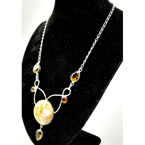 869 - A Leopard Agate and Smoky Quartz Drop Pendant on a  Silver (925) Necklace. 40cm