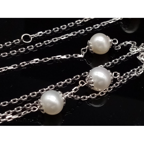 45 - A Gorgeous 18K White Gold South Sea Pearl Necklace with a  Seven Diamond 18K White gold Pendant. 3 a... 
