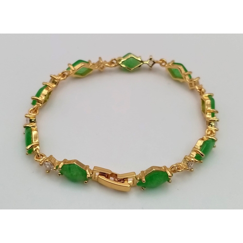 769 - A Jade and White Topaz Gilded Bracelet. 18cm