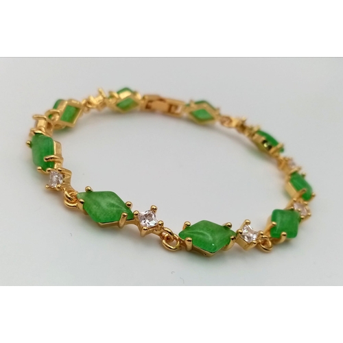 769 - A Jade and White Topaz Gilded Bracelet. 18cm