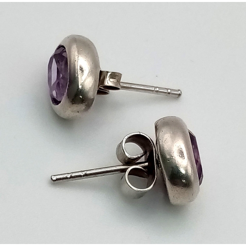 893 - A Pair of 925 Silver and Amethyst Stud Earrings.