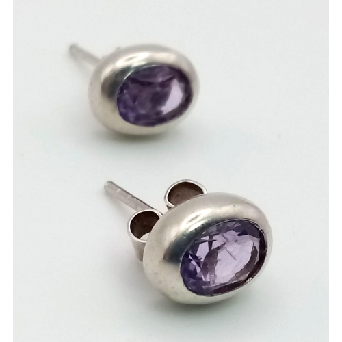 893 - A Pair of 925 Silver and Amethyst Stud Earrings.