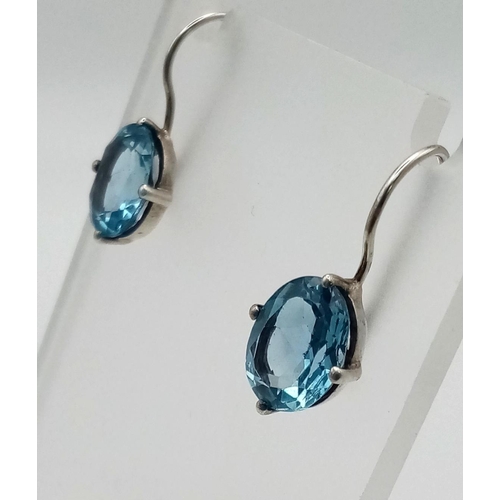 907 - A Pair of 925 Silver Well-Faceted Aquamarine Earrings.