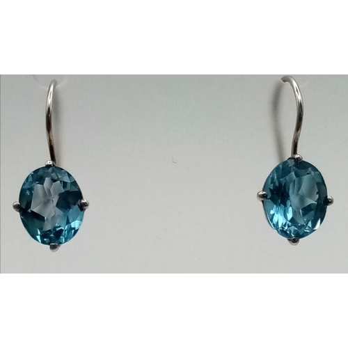 907 - A Pair of 925 Silver Well-Faceted Aquamarine Earrings.