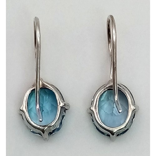 907 - A Pair of 925 Silver Well-Faceted Aquamarine Earrings.