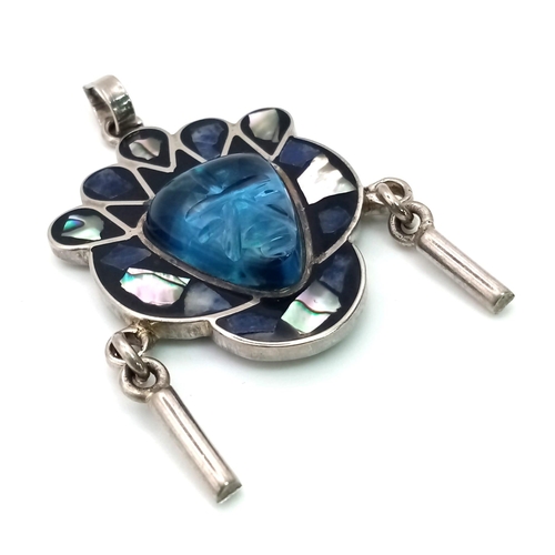 971 - An Inca Inspired Mexican Blue Stone and Inlaid Mother of Pearl Pendant Set in Silver. 5cm