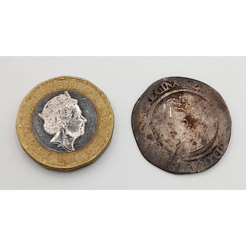 1135 - An Elizabeth I Silver Hammered Six Pence Coin. 1567.
2.44g. Please see photos for conditions. A/F.