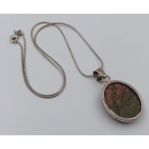 1016 - A 925 Silver and Unakite Pendant on a Silver Chain. 44cm and 3cm.