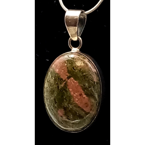 1016 - A 925 Silver and Unakite Pendant on a Silver Chain. 44cm and 3cm.