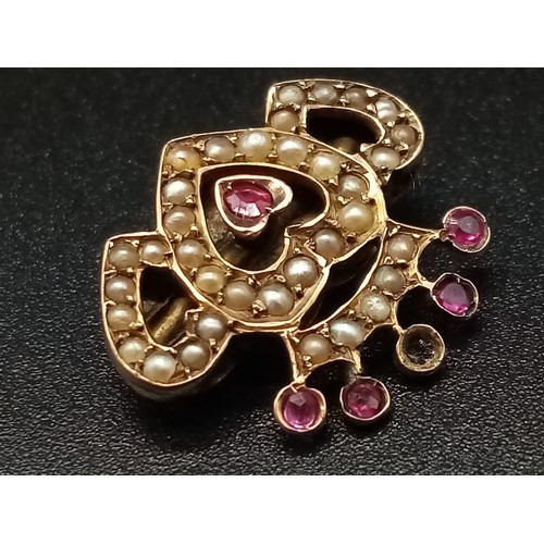 1173 - A REGAL STYLE GOLD , BURMESE RUBY AND PEARL BROOCH POSSIBLY RUSSIAN . 2.58gms (one stone missing)