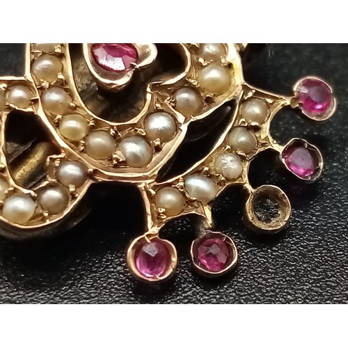 1173 - A REGAL STYLE GOLD , BURMESE RUBY AND PEARL BROOCH POSSIBLY RUSSIAN . 2.58gms (one stone missing)