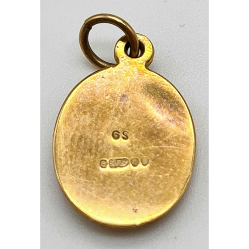 1006 - A 9K Yellow Gold Cameo Pendant. 12mm. 1g total weight.