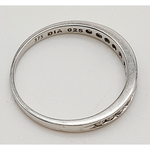 919 - A 9K White Gold Diamond Half Eternity Ring. Size J.
1.12g total weight.