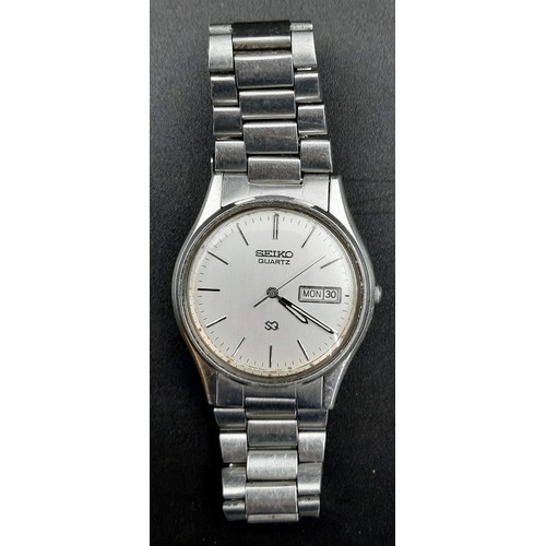 268 - A Vintage Seiko Quartz Gents Stainless Steel Watch. 
Case - 34mm. Day/date window. In working order.