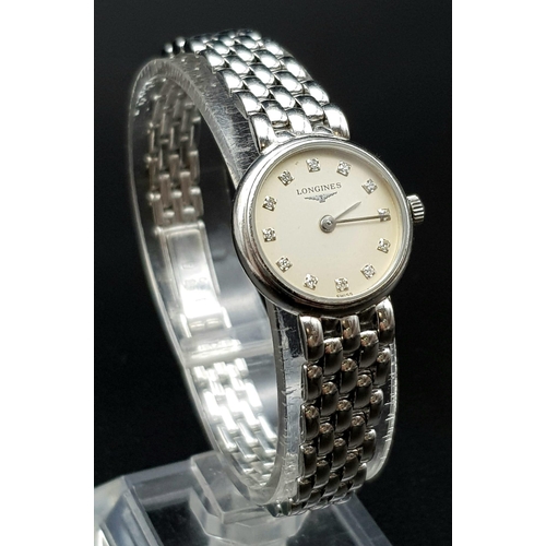 737 - A LONGINES 18K WHITE GOLD LADIES DIAMOND SET DIAL WATCH - 18MM CASE. 31.2G TOTAL WEIGHT. EXCELLENT C... 