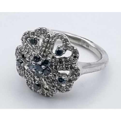 898 - 10K WHITE GOLD DIAMOND SET FLOWER CLUSTER RING. SIZE N. 0.45CT. 6G.