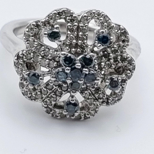 898 - 10K WHITE GOLD DIAMOND SET FLOWER CLUSTER RING. SIZE N. 0.45CT. 6G.